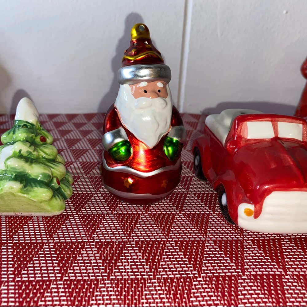 Christmas salt shakers, Santa Claus, truck, Christmas tree.